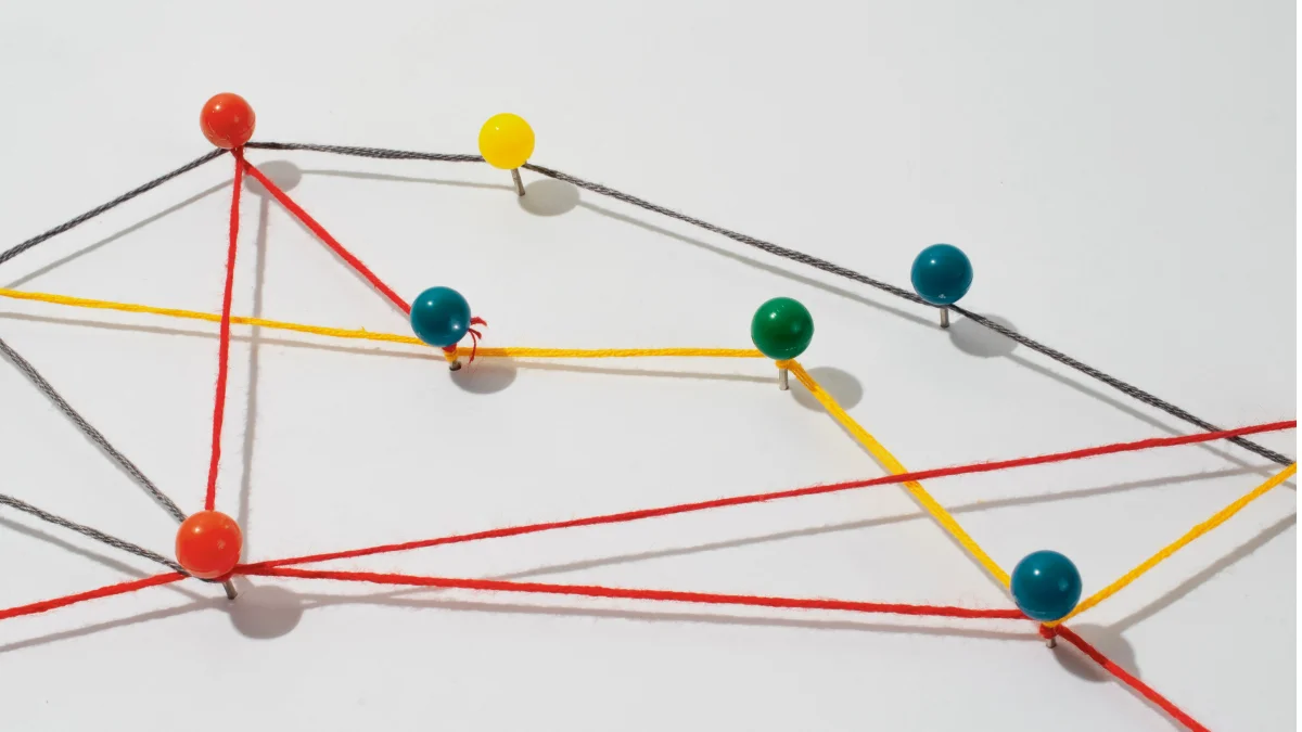  Still life of red thread connection representing topic clusters